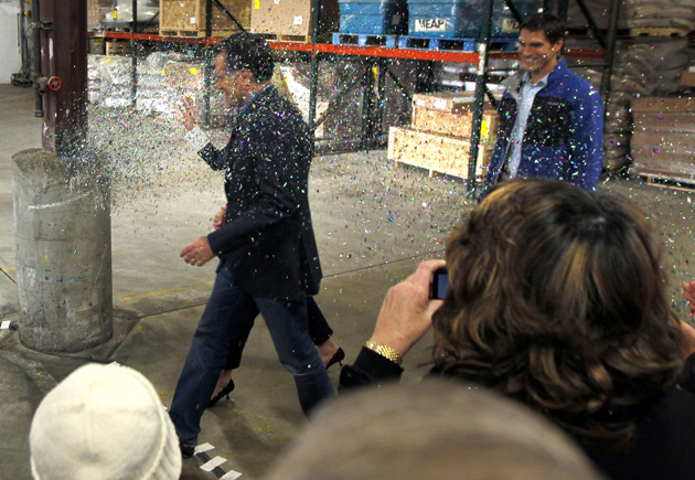 Mitt Romney got glitter-bombed TWICE today in Minnesota. AP’s Gerald Herbert got a great shot of the first “bombing”–which pretty much looks like a parade.