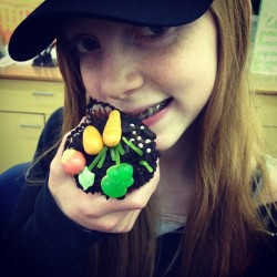 Cute Lydia with her new braces and a garden cupcake she made. (Taken with instagram)