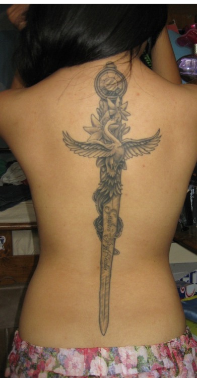 fuckyeahtattoos:  Healed! The Sword of Gryffindor done by the tremendously talented Toby Shipman (http://www.tobyshipman.com/). Harry Potter’s the best thing that’s happened to my world, alright? 