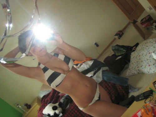 XXX Cute babe doing self shots photo