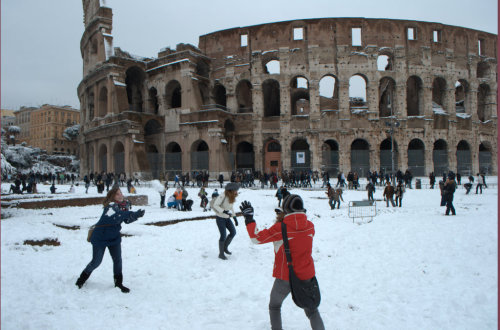 Snowball fight in front of Colosseo, Rome.