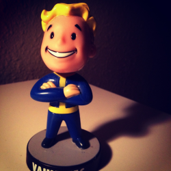 nebulasinbloom2010:  My bobble head. Vault Boy watches me sleep and stuff. 