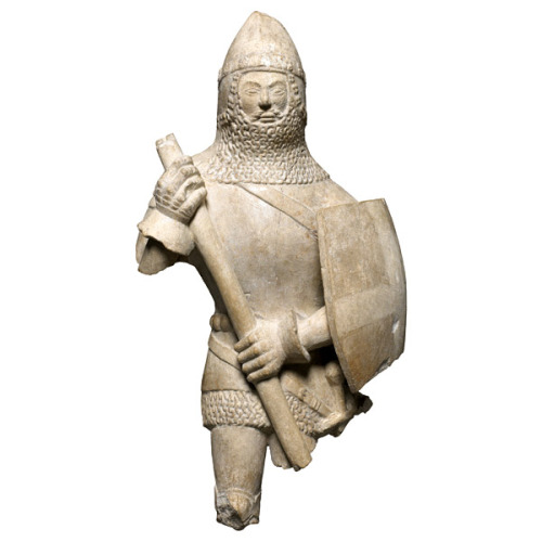 A small English statue from ca. 1350-1450. Some people have guessed that, because of the cross on th