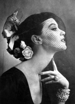 theniftyfifties:  A hat and veil for Vogue
