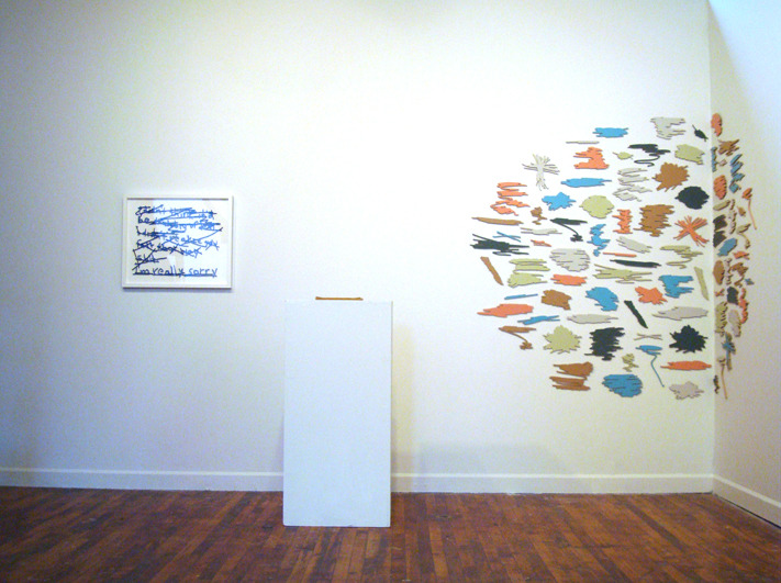 Crossed out words, cut out of wood by Matthew Hoffman