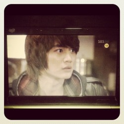 Watching Minho’s sitcom while eating