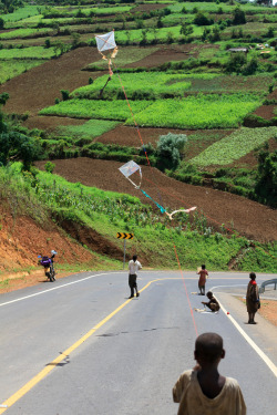  Flying kites in Kabale, Uganda Photo by