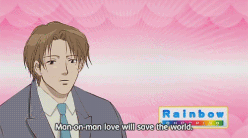 Pink GIF of an anime guy saying 'Man-on-man love will save the world.' on a fictionalized news broadcast.