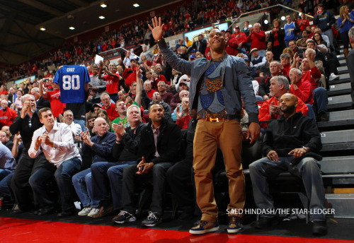 saedhindashblog:  New York Giants Wide Receiver Victor Cruz acknowledges the crowds cheers as he is introduced during the Rutgers Mens’ basketball game against Seton Hall Wednesday February 8, 2012.    I WAS IN THE PEP BAND, BASKING IN HIS BEAUTY.