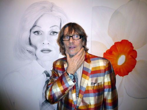 Chris Makos in from of his portrait of Lady Warhol