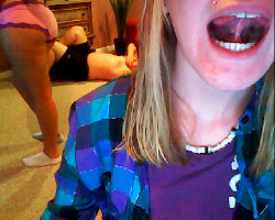 touchyouinyoursleep:  My new piercing and Jordan in her underwear. We just don’t wear clothes. Hehe. 