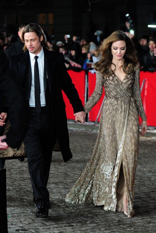 suicideblonde:  Brad Pitt and Angelina Jolie (wearing Salvatore Ferragamo) at the Berlin Film Festival premiere of In the Land of Blood and Honey, February 11th 