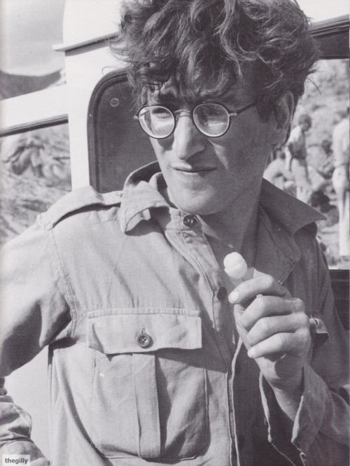 thegilly:John sucking a lollipop on the set of How I Won the War in Almeria, Spain, 1966. Photos by 