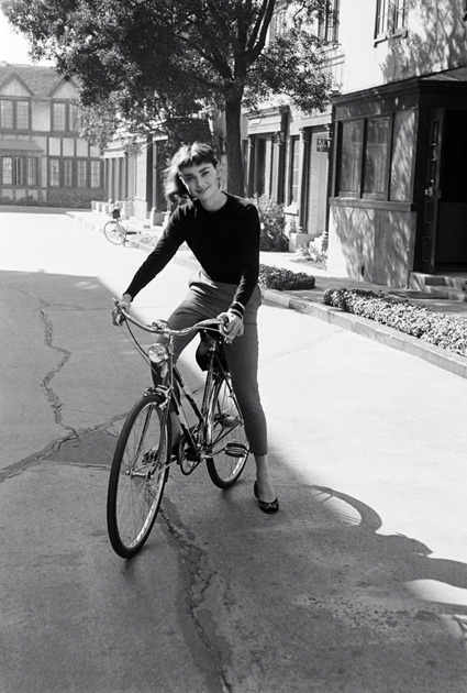 Audrey Hepburn on a bicycle.submitted by sailingwiththeturtles.