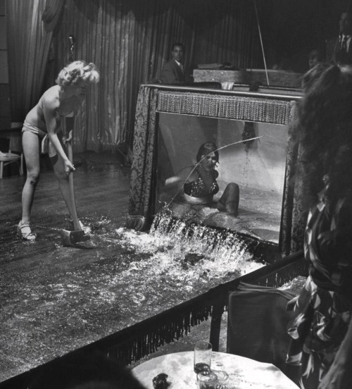 houseofpinkboombox: legrandcirque: John Dominis, Stripper Evangeline Sylvas angrily breaking the wat