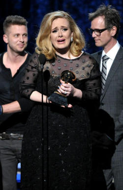 Adele accepts the award for Album of the Year at The 54th Annual Grammy  Awards at Staples Center on February 12, 2012, in Los Angeles,  California.