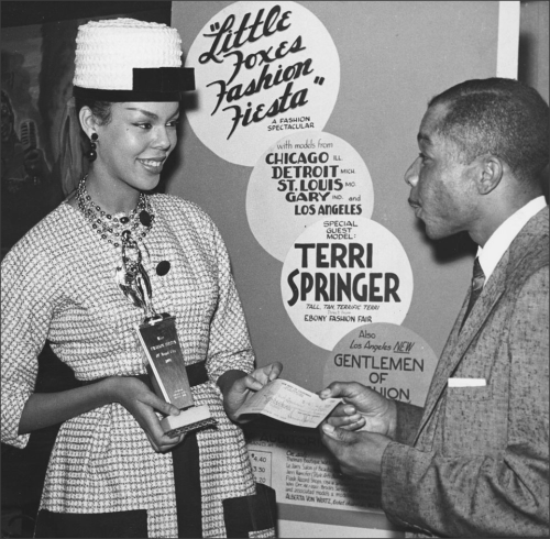 First prizeFashion Fiesta winner receiving her prize ca. 1960