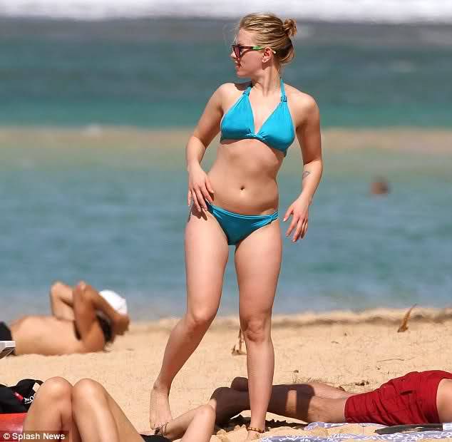  This is Scarlett Johansson at a beach in Hawaii. She is one of the most gorgeous