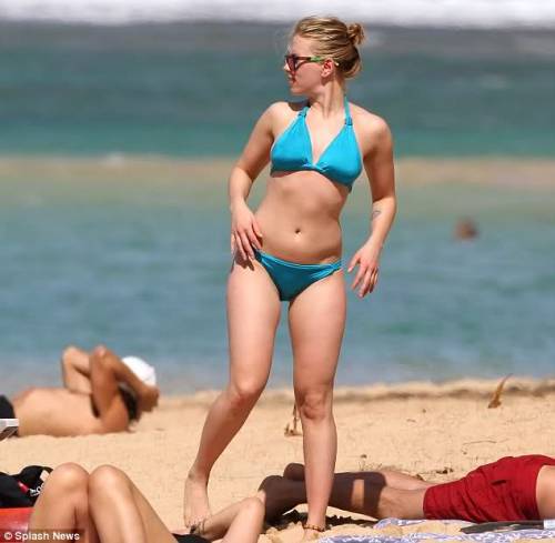 vixk:  feminine-desires:  restlesslyaspiring:  strongerquickerbetter:  fit-foot-forward:   This is Scarlett Johansson at a beach in Hawaii. She is one of the most gorgeous women in the world and a huge sex symbol. She isn’t totally skinny, she only