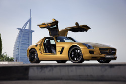 automotivated:The “Desert Gold” Mercedes-Benz SLS AMG in front of the Burj Dubai (by SLS AMG) 