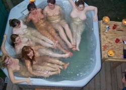 nudistlifestyle:  Nudist girls share a jacuzzi !