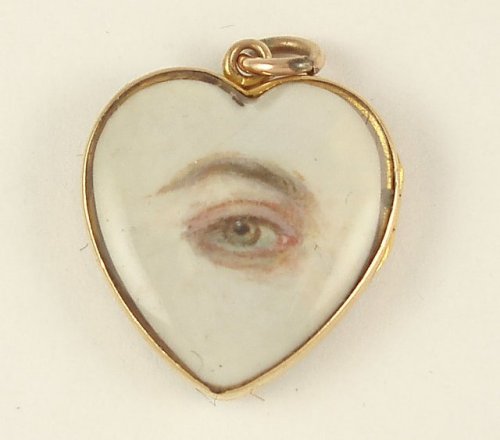 “lovers’ eye”, eye miniature on ivory, c. 1830s. hand-painted miniature of a left hazel eye on ivory in heart-shaped pendant. eye miniatures or lovers’ eyes were georgian miniatures, normally watercolour on ivory, depicting the eye or eyes of