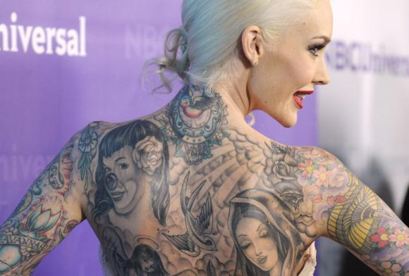 pinupinprocess:  The fact that she has Bettie Page on her back makes me love her