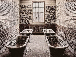  graffiti in an abandoned mental institution
