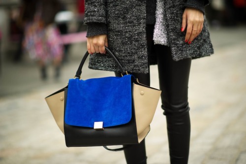 Reblogged via elle: London is loving the Céline trapeze bag! (as am I) Photo: Photo: Adam Katz Sindi