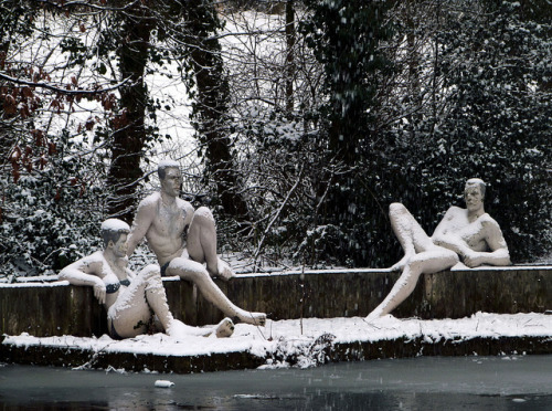 renire:  untitled on Flickr. Statues in Swindon…  “Looking to the Future” by John Buck (1985) They must have been freezing sat in the snow like that ;) 