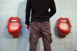 metalonmetalblog:  &ldquo;Kisses!&rdquo; is a controversial urinal designed by the female Dutch designer Meike van Schijndel. It is shaped like an open pair of red lips. In early March 2004 the National Organization for Women (NOW) took offence to the