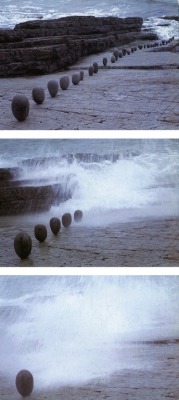 cavetocanvas:Andy Goldsworthy, Balanced rocks / brought down by the incoming tide / those in a line / bouncing and banging / as they fell / then rolled around by the sea, 1993
