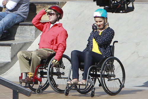 myfeetlitup:brianwilly:fyeahgleecast:Actress Dianna Agron and Kevin McHale get ready to wheelchair r