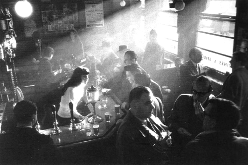 Pub in Soho, London, 1955 by Willy Ronis