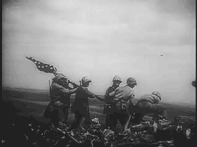 deadpresidents:  todaysdocument:  Marines raising the flag atop Mount Suribachi during