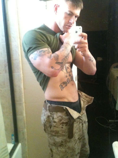 boysinthewild:  tats, muscle and camo… the whole package