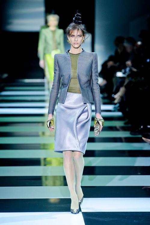 Giorgio Armania Spring 2012 - White tights with shiny light blue skirt, green top and dark blue jack