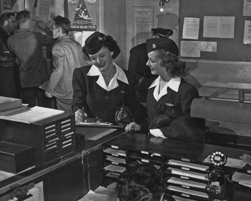 Checking in before a flight 1955 American Airlines