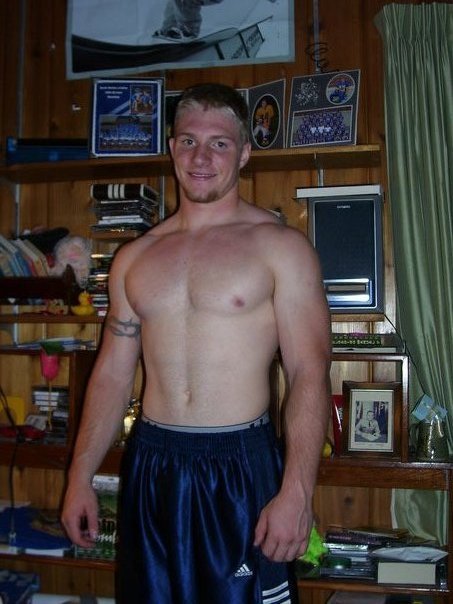 thelockerroom:  Exhibitionist football stud shows off his muscled body and his thick, hard cock. 