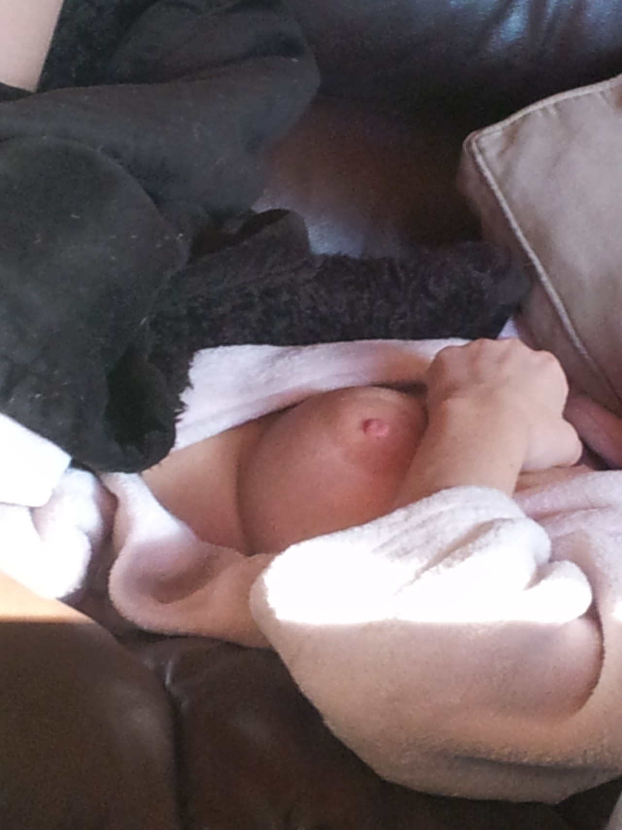blondebigboobs:  Titty fell out while she was having a nap on the couch… She didn’t
