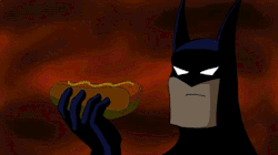  Batman eating a hotdog. Hotdog eating a