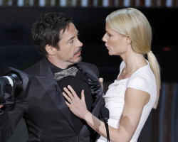 nparts:  Gwyneth Paltrow grabs the jacket of Robert Downey Jr. before they present the Oscar for Best Documentary Feature. (REUTERS/Gary Hershorn)Related:Live Chat: The 2012 Academy Awards Photo Gallery: The 2012 Academy Awards  I just need them to be