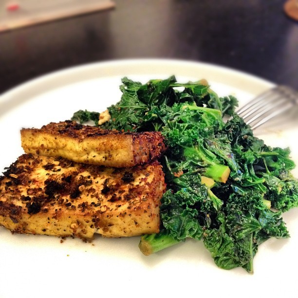 Smoky and spicy dry rub tofu steaks with sautéed kale. Why can&rsquo;t I stop