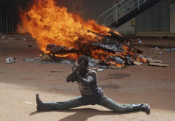 politics-war:  An Ugandan protester poses