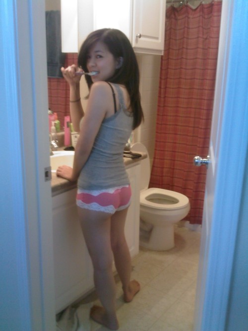 Hot Asian teen in BoyShorts brushing her teeth. Great ass and amazing panties!