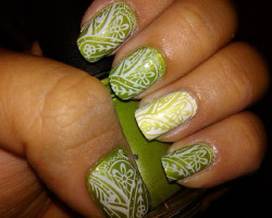 beautylish:  Loathe or Love: Nail Stamping? We love Beauty Marissa D.’s green paisley nail patter!