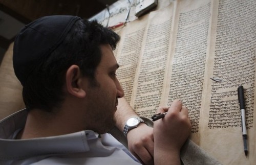 israelfacts: Professional Torah restorer Mehrdad Sassany works on the restoration of a 100 to 120-ye