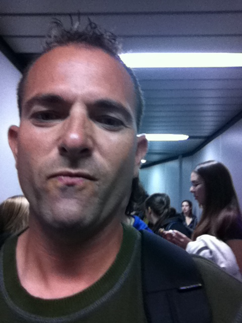 Trying  to control my laughing at the pack of stupid valley girls behind me at lax.