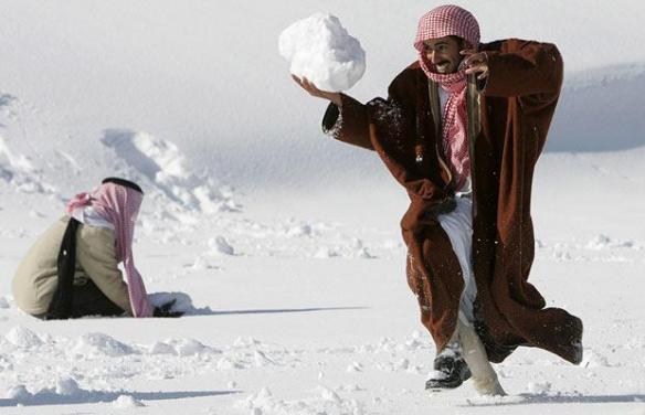 hijabby:  ircimages:Jordanian Bedouins having fun with the snow. Genuine happiness.