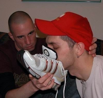 itrespondswelltoitssuperiors:faggot smelling its Master’s feet. it is a dog. And